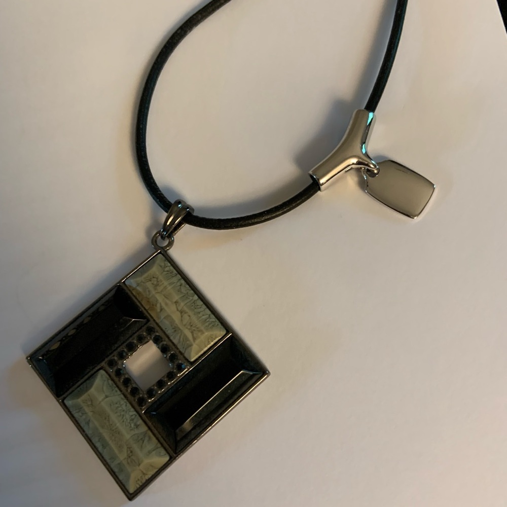 Lia Sophia cord necklace with 2 interchangeable charms. 14in.